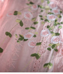 Radiate Elegance with Our Peach Embroidery Tunic for Women